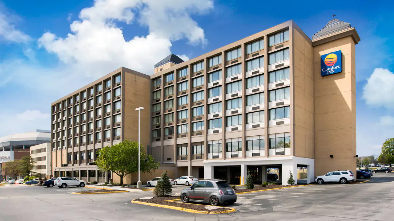 Photo: Daytime exterior of Comfort Inn & Suites Event Center hotel.